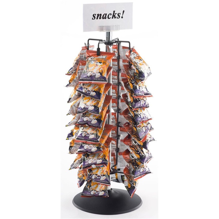 Rotating metal retail store display fixture for snacks